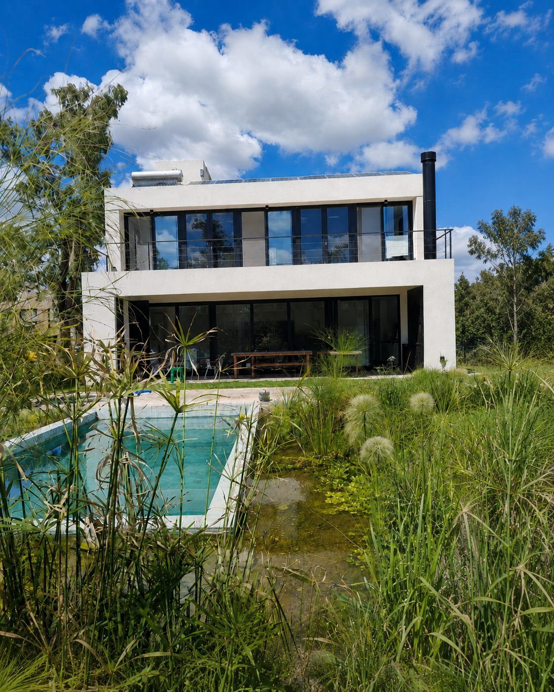 Casa ADB, vivienda unifamiliar sustentable en Francisco Álvarez, Buenos Aires — foto 4 de 12. Proyecto del Arq. Germán Vazquez